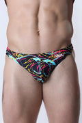 Vaux pulse swim thong featuring vibrant neon pink yellow and cyan abstract lines on black men’s swim trunks