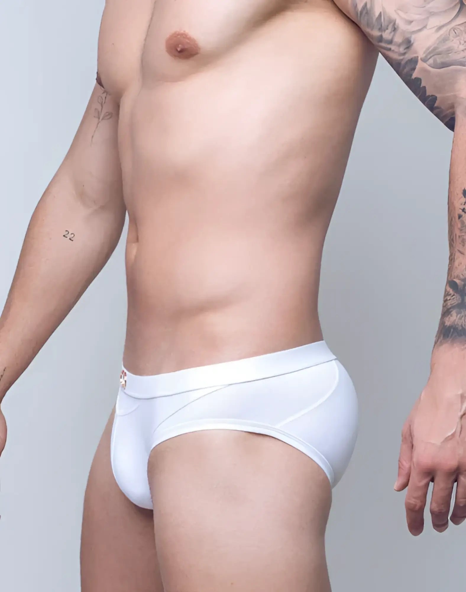 White vb13 swim brief athletic mesh briefs with textured panel and subtle logo on waistband front view