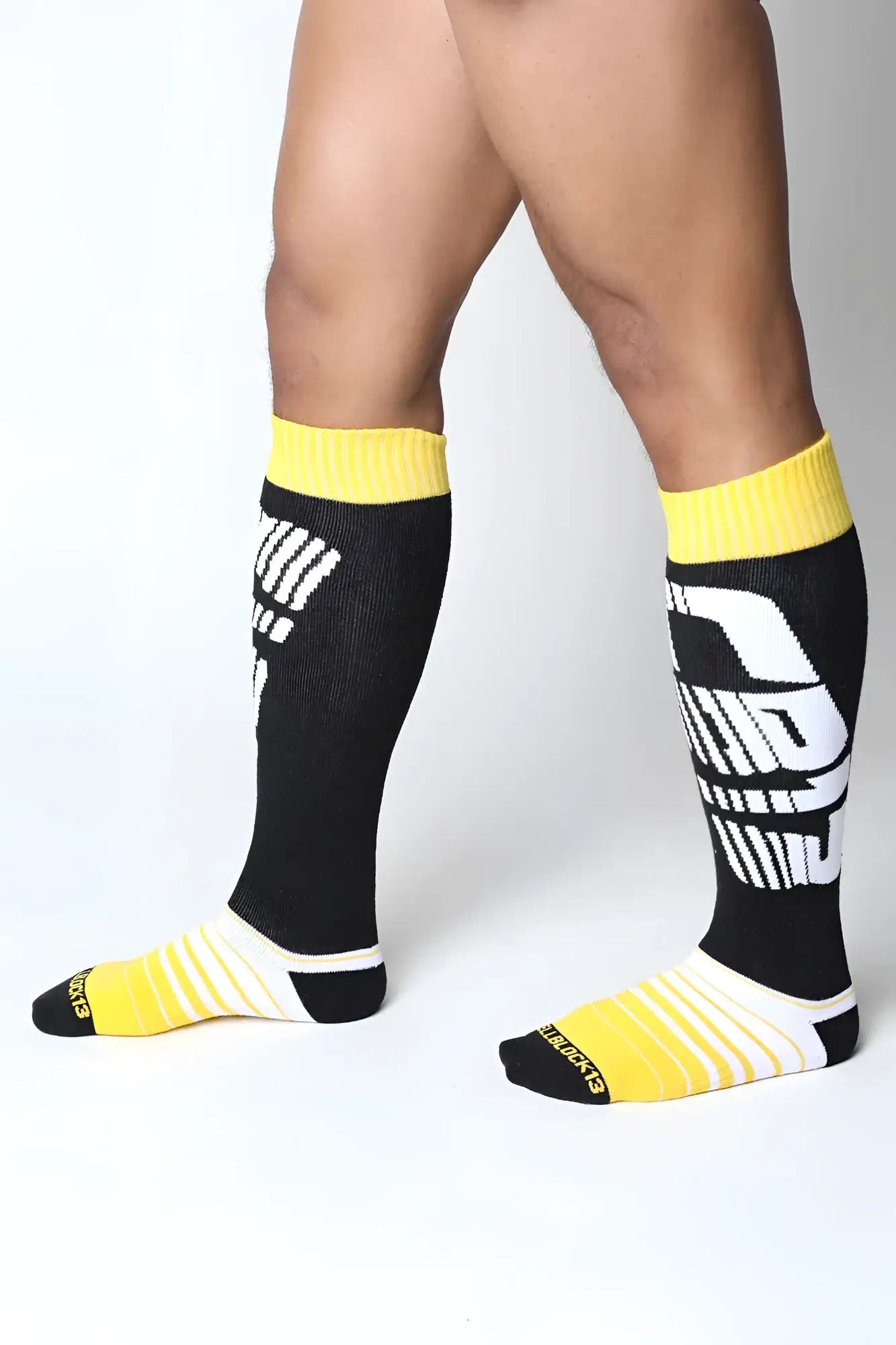 Black and yellow velocity 2.0 knee high socks with bold white graphic design in three colors to choose from