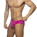 Vibrant pink velvet shady bikini brief with a subtle pattern and an orange brand tag for men