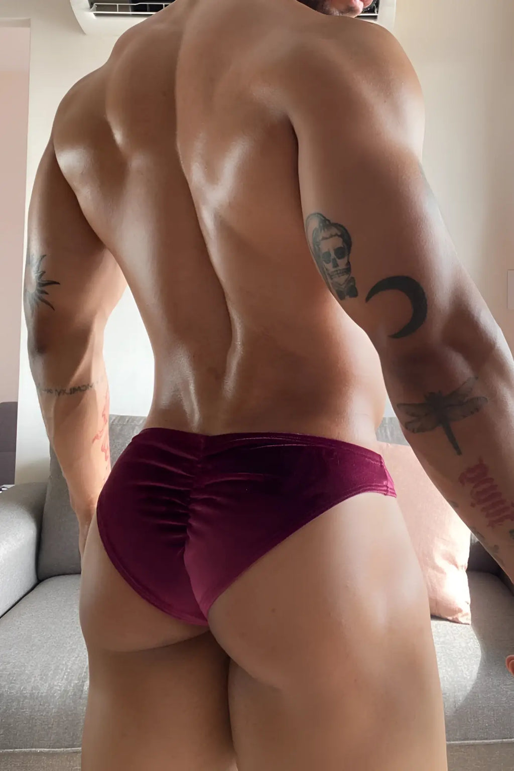 Deep burgundy velvet velvety scrunch-butt bikini briefs showing ruched back detail for a flattering fit