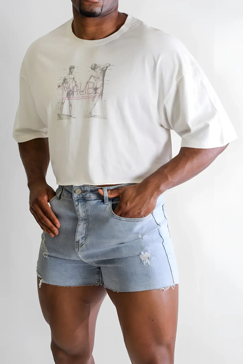 White oversized vintage-washed drop-shoulder crop tee with a gray anatomical illustration print on front