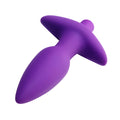 Vogue Aria purple silicone vibrating butt plug with a smooth, tapered shape and T-bar base, set against a white background.