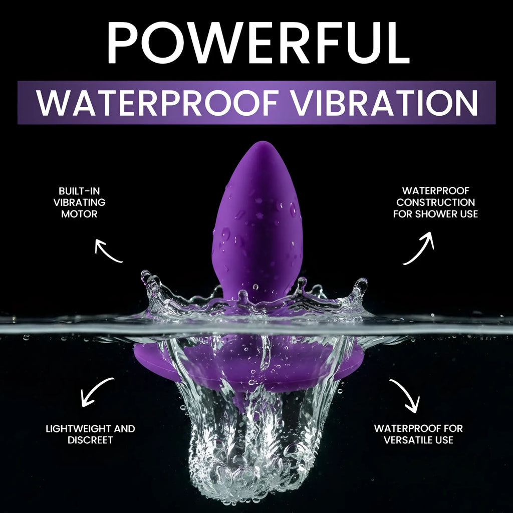 Vogue Aria purple silicone vibrating butt plug splashing into water, highlighting waterproof and discreet features.