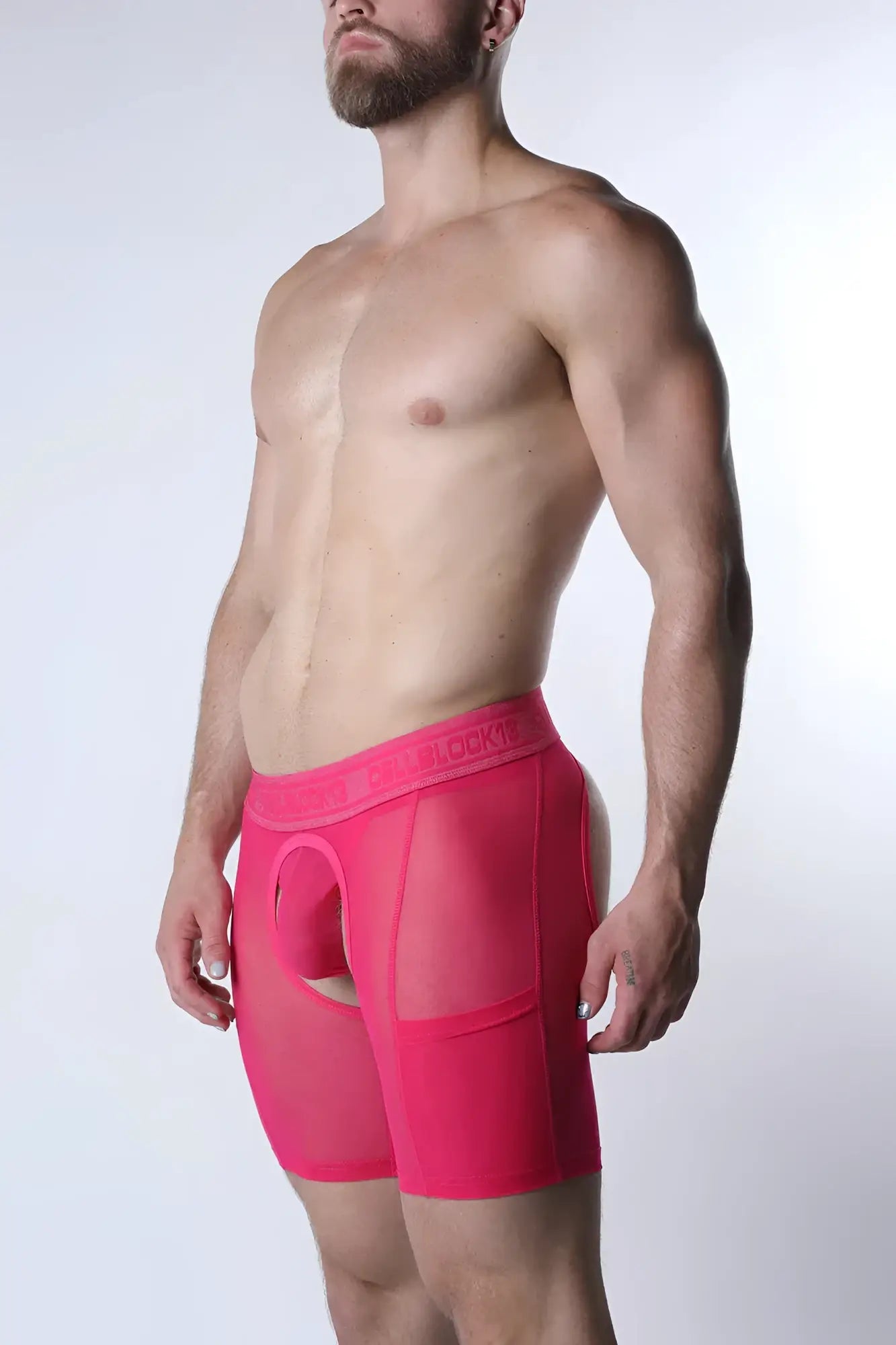 Bright pink sheer mesh boxer briefs with solid waistband void chap short front view