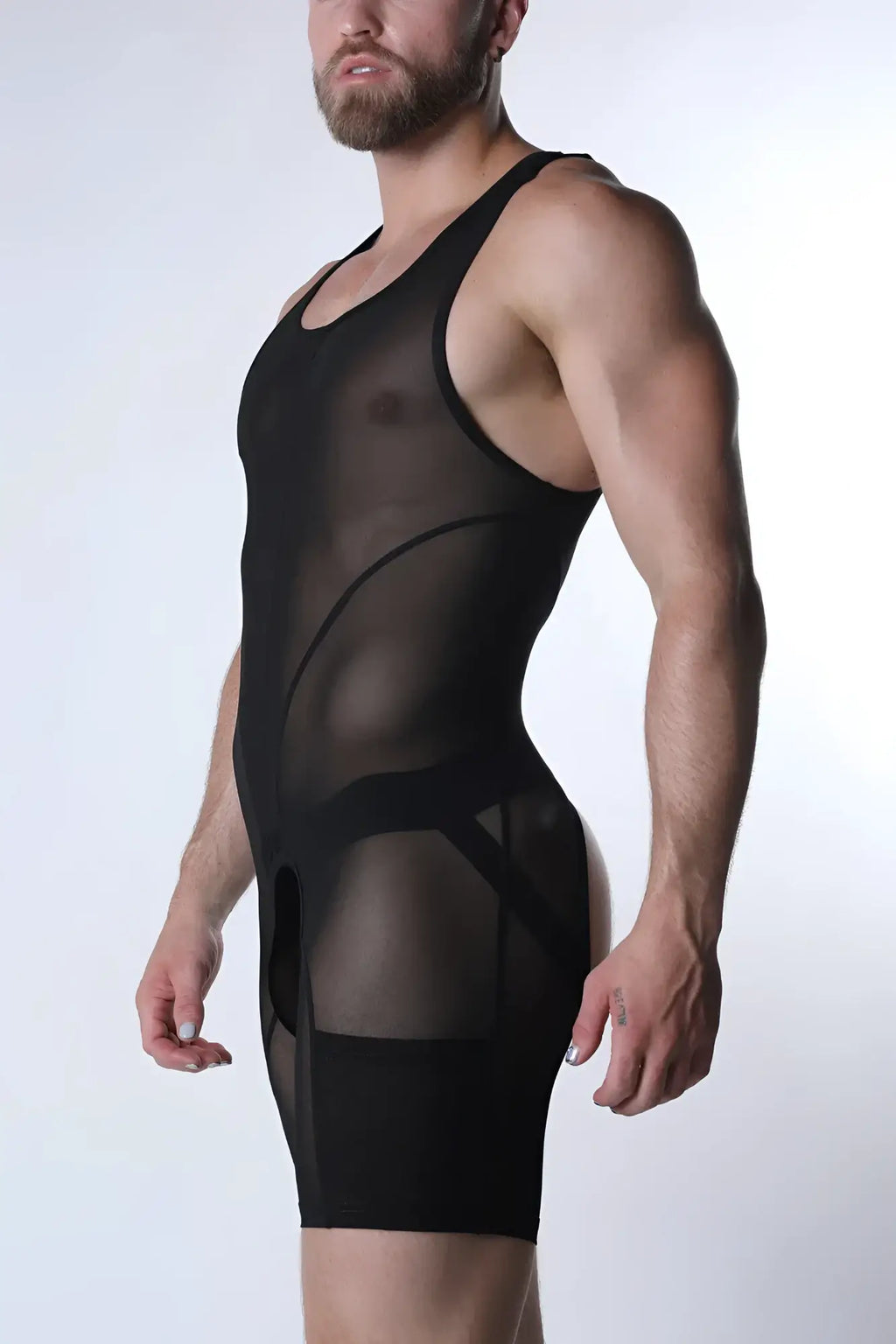 Black sheer mesh void mesh body suit with opaque paneling and reinforced straps for a sleek bodycon fit