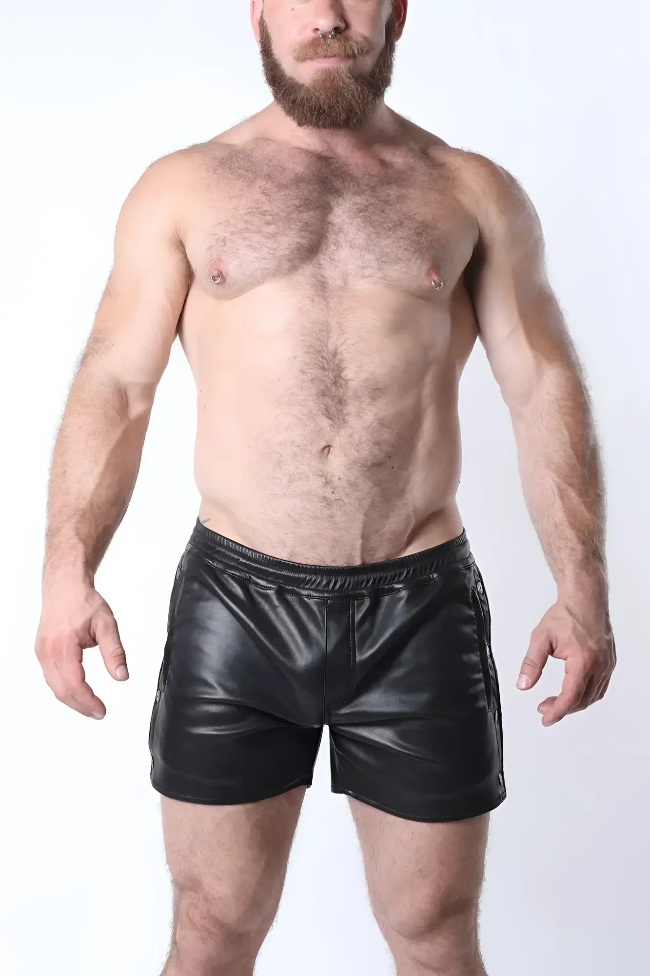 Black faux leather void snap up short with shiny smooth texture and side zippers for a stylish look