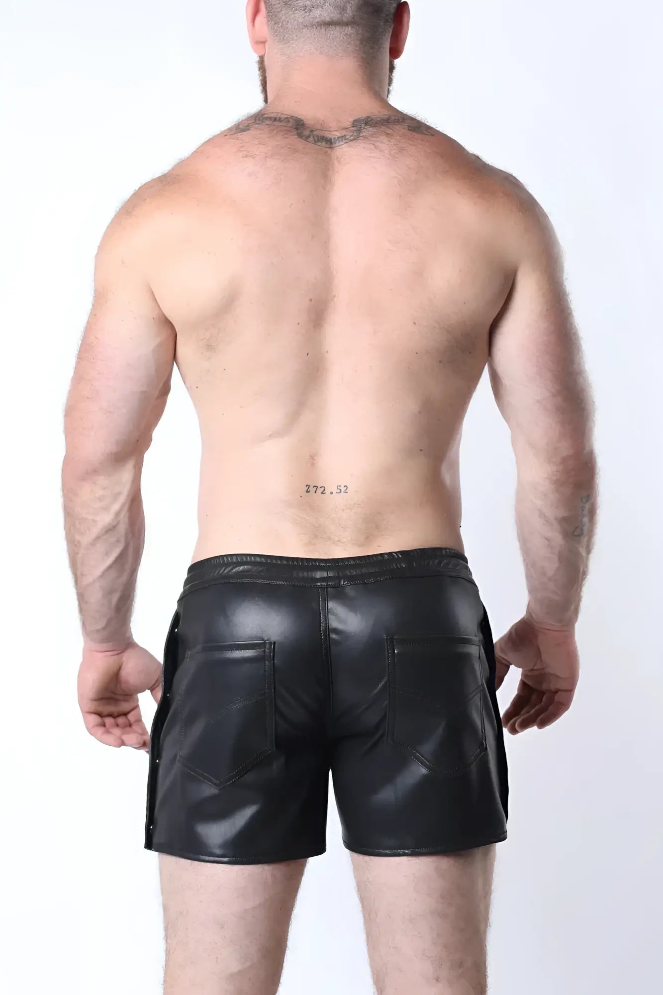 Black leather void snap up short with glossy finish and two front pockets for stylish casual wear