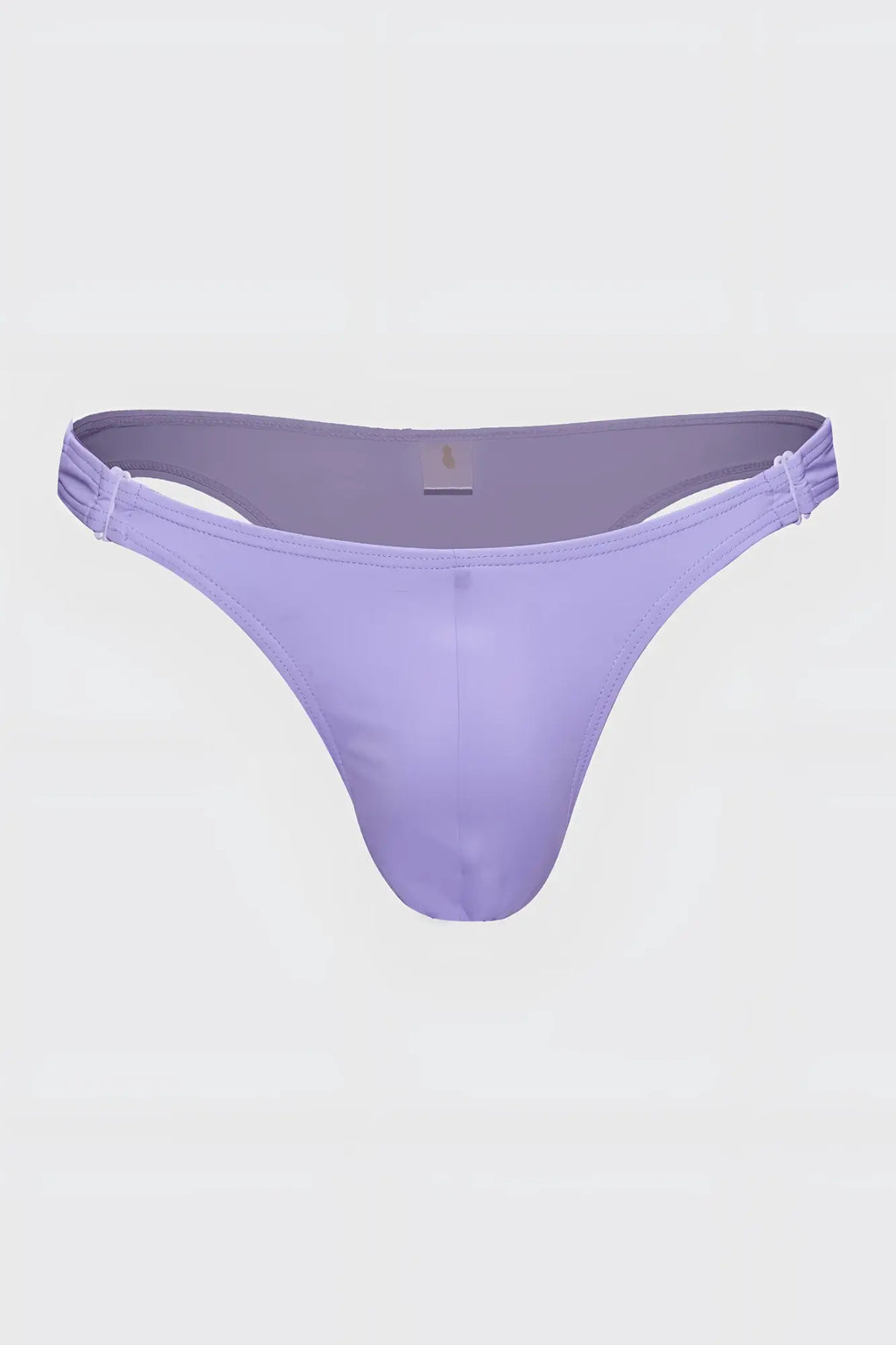 A sleek lavender voyage low-cut swim bikini brief for men made of smooth stretchy fabric with ruched side straps