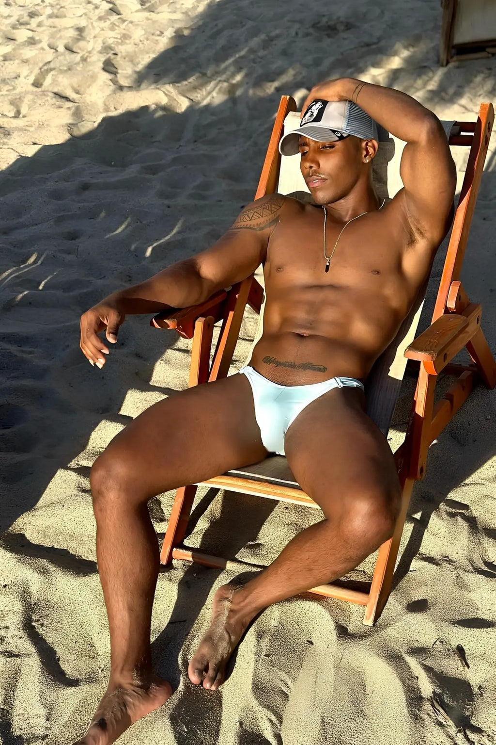 Light blue voyage low-cut swim bikini briefs for men made of quick-dry fabric ideal for beachwear