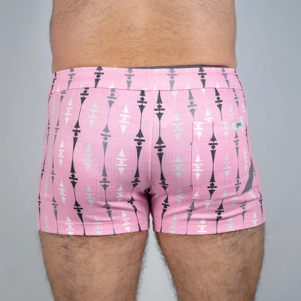 Wallpaper print linen texture shorts in pink with black and white geometric pattern side pocket and brand tag