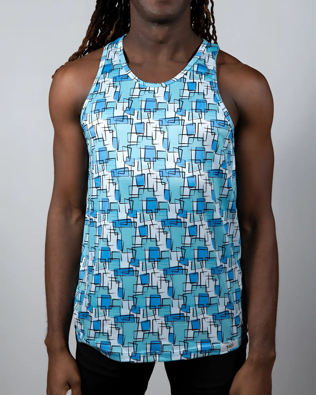 A men’s tank top with a vibrant blue geometric wallpaper print on a white background for casual wear