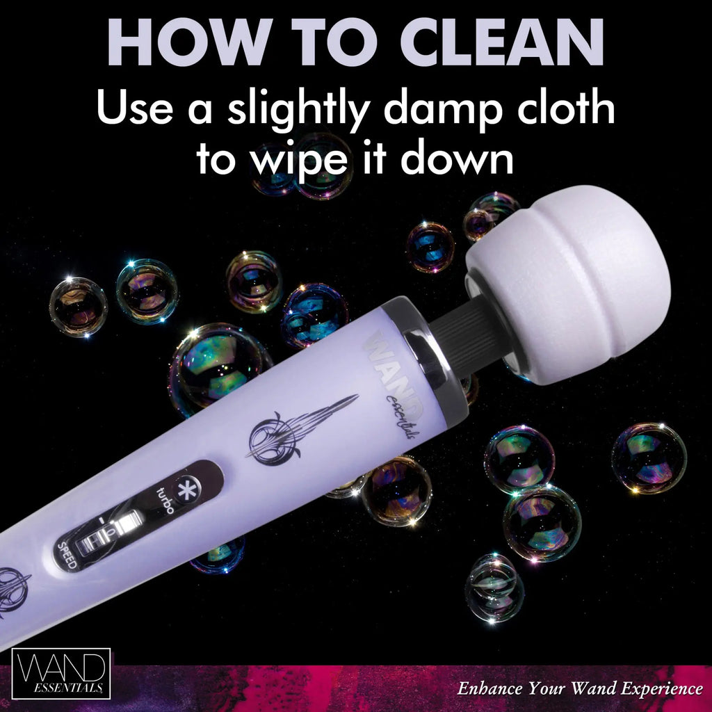 Wand Essentials 8-Speed Turbo Pearl wand massager in pastel purple against a black background with floating bubbles.