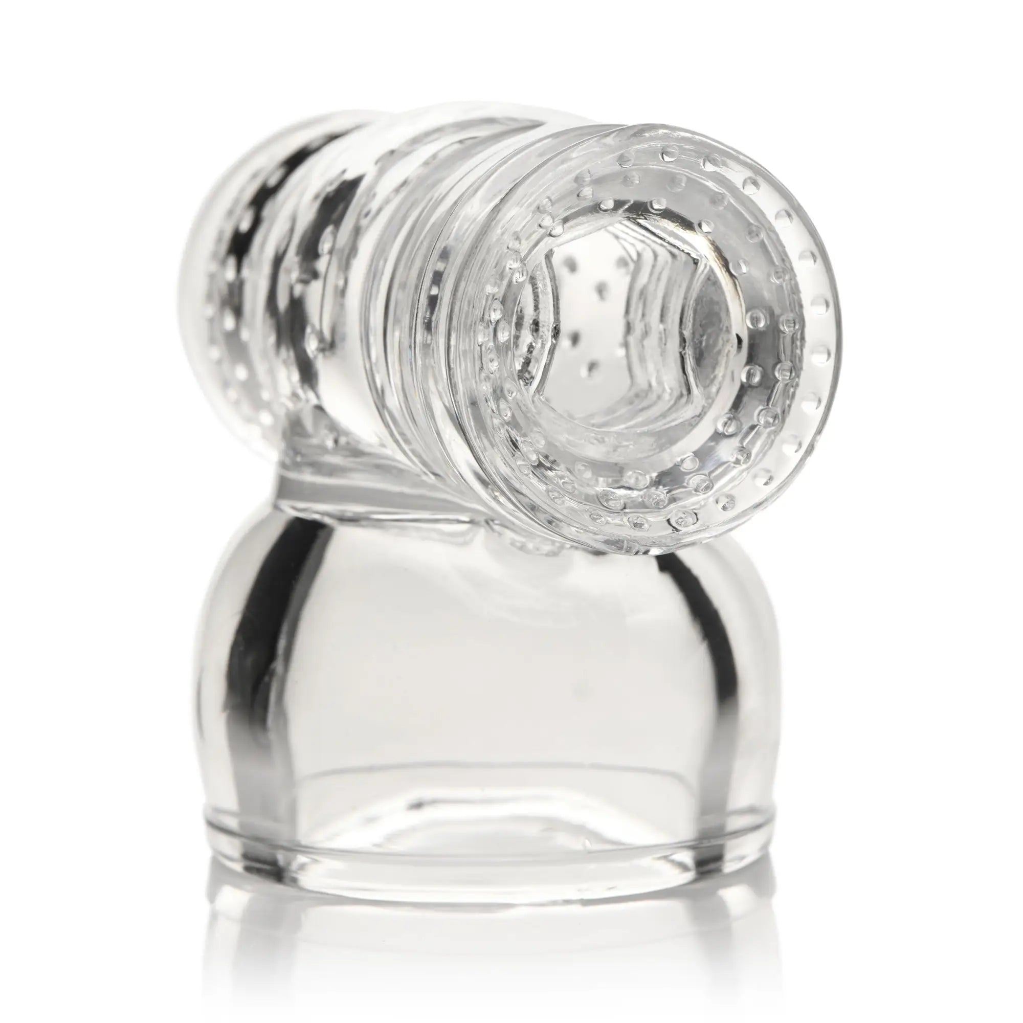 Wand Essentials Firm sleeve: clear, textured silicone massager attachment with a ribbed, hollow design.
