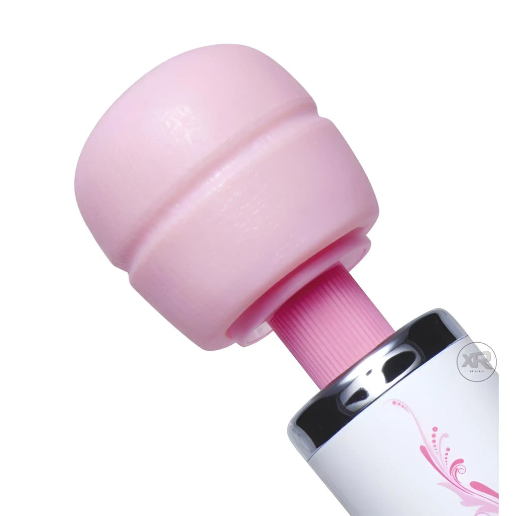 Wand Essentials The Trinity massager: pink bulbous head, textured neck, and white handle with floral accents.