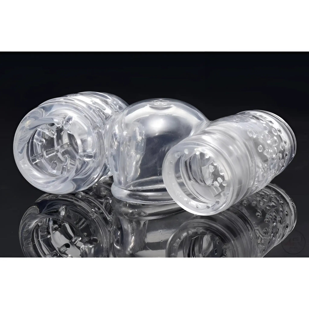 Wand Essentials Twin Turbo Strokers: Clear, textured silicone wand attachments shown from multiple angles.