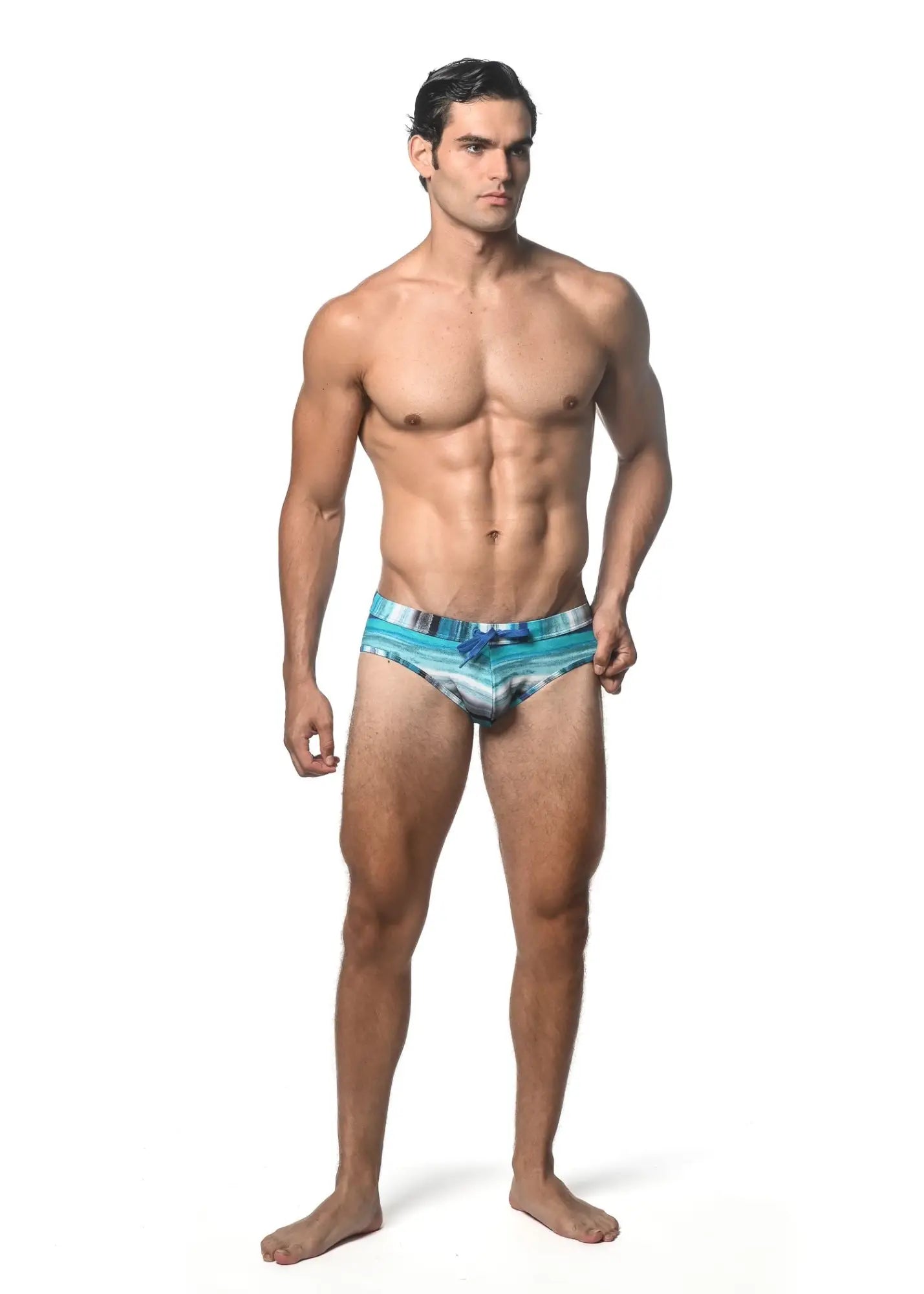 Men’s watercolor stripe printed swim brief in blue and white with striped pattern and bow detail for swimming