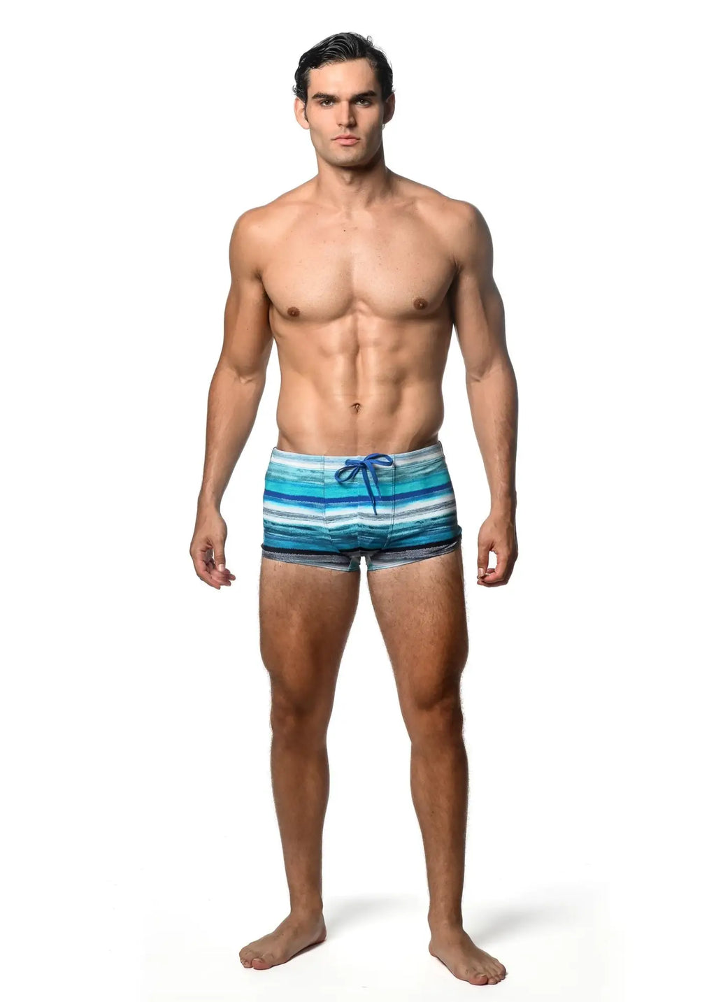 Watercolor stripe printed men’s swim trunks with horizontal blue and white stripes and a matching blue drawstring