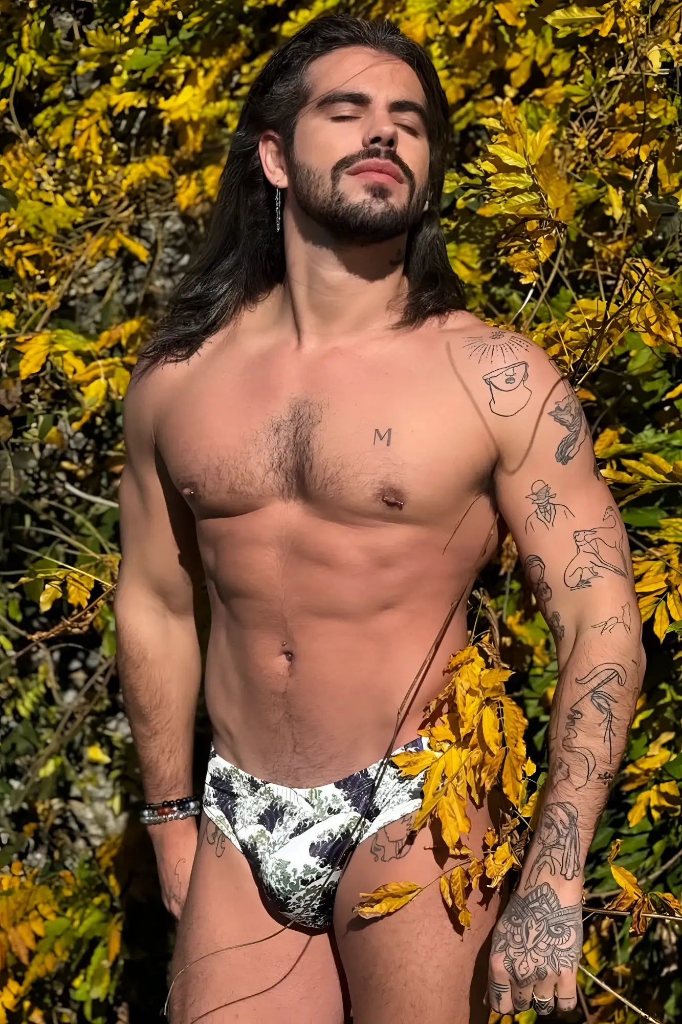 Wet-n-wild swim briefs crashing waves feature black and white patterned bold graphic design for swimming