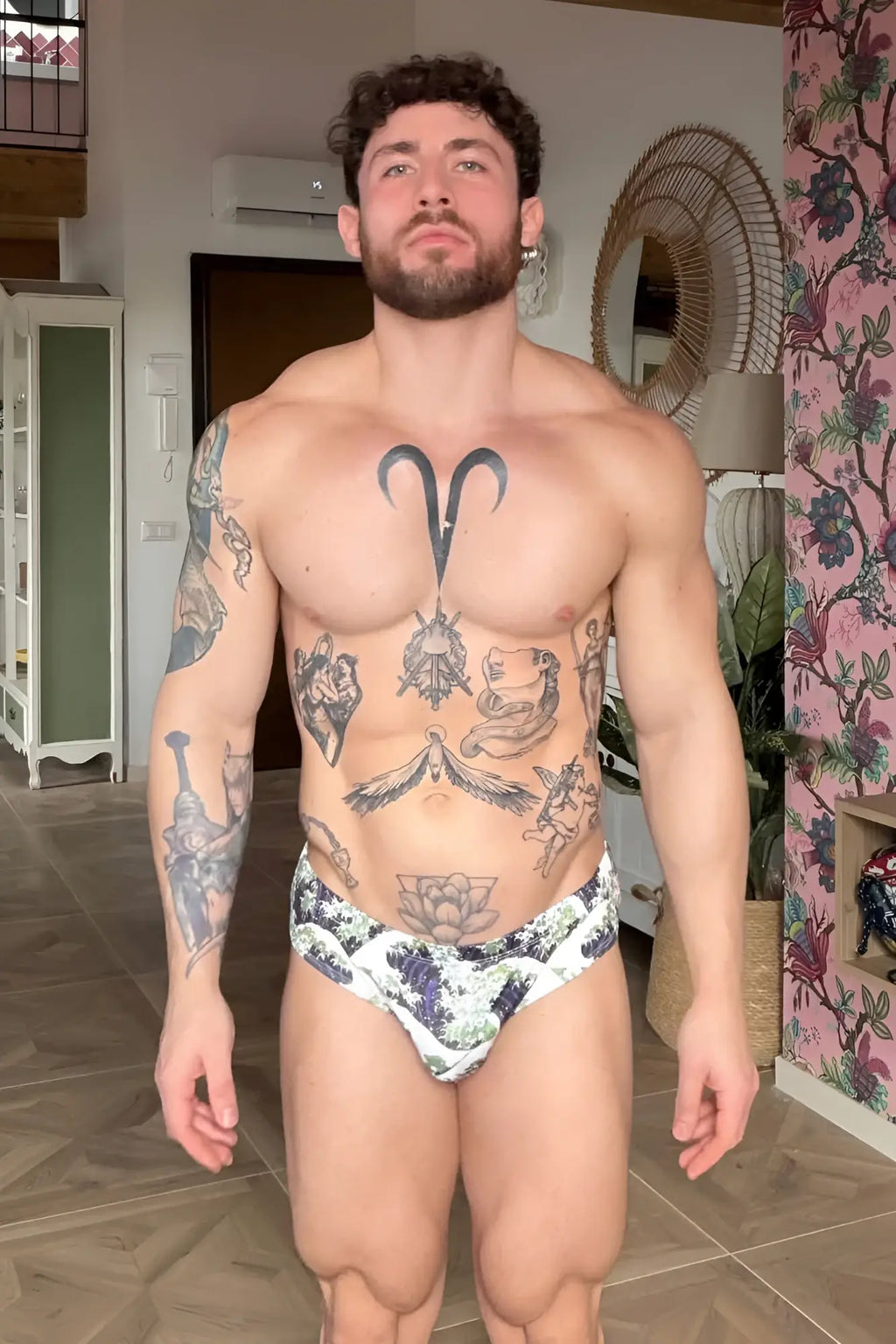 Wet-n-wild swim briefs in white with a black and purple floral pattern perfect for beach and pool wear