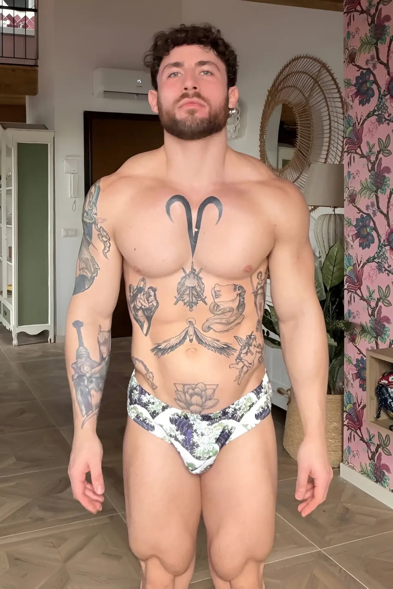 Wet-n-wild swim briefs in white with a black and purple floral pattern perfect for beach and pool wear