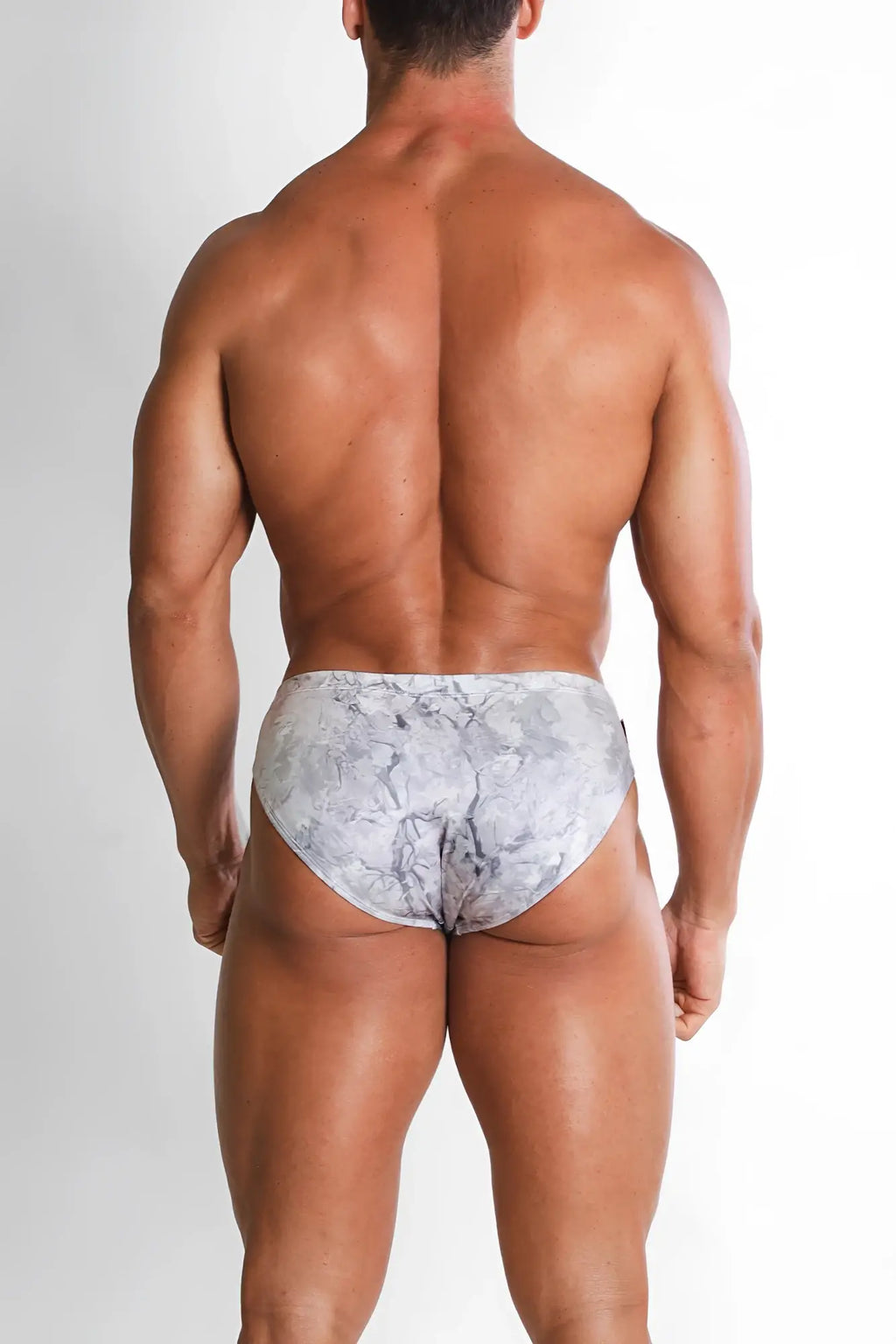 Wet-n-wild swim briefs in grey camo with gray and white marble pattern designed for swimwear use