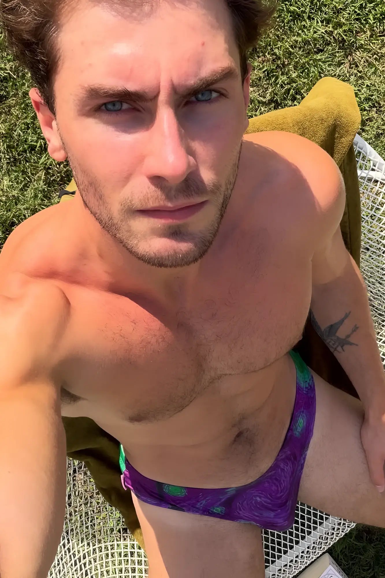 Wet-n-wild swim briefs spooky night purple swim trunks with swirling green and teal pattern for swimming use