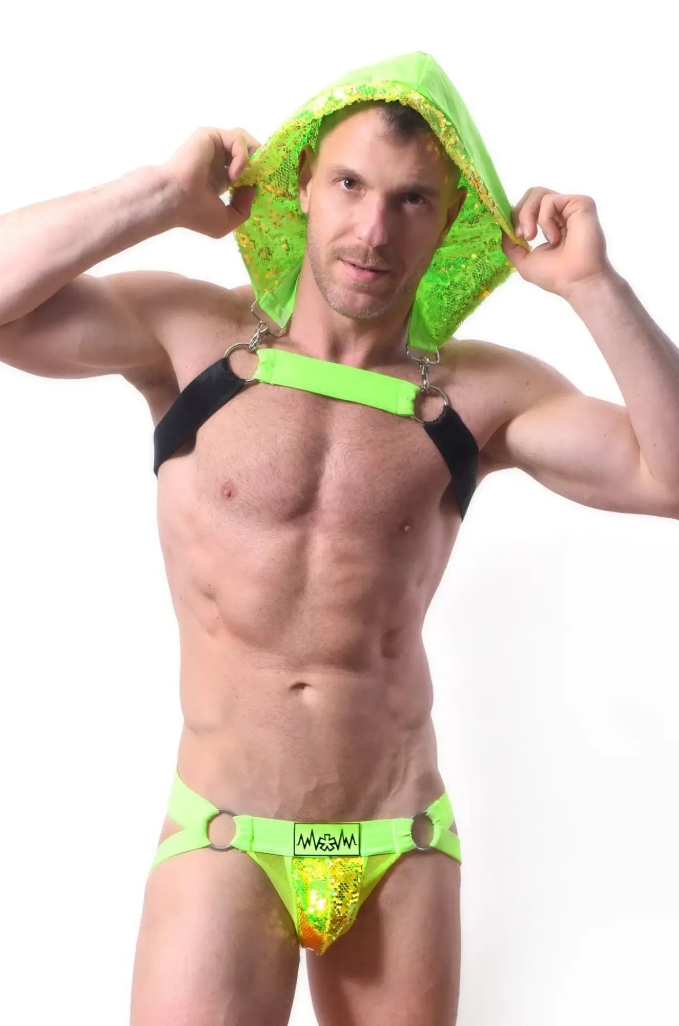 Neon green sequined hood harness set with black straps and metallic rings for edgy festival or club wear