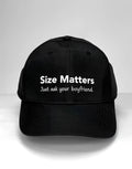 Black baseball cap with "Size Matters. Just ask your boyfriend." printed in white text.