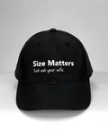 Black baseball cap with white text that reads "Size Matters" and "Just ask your wife." centered on the front.