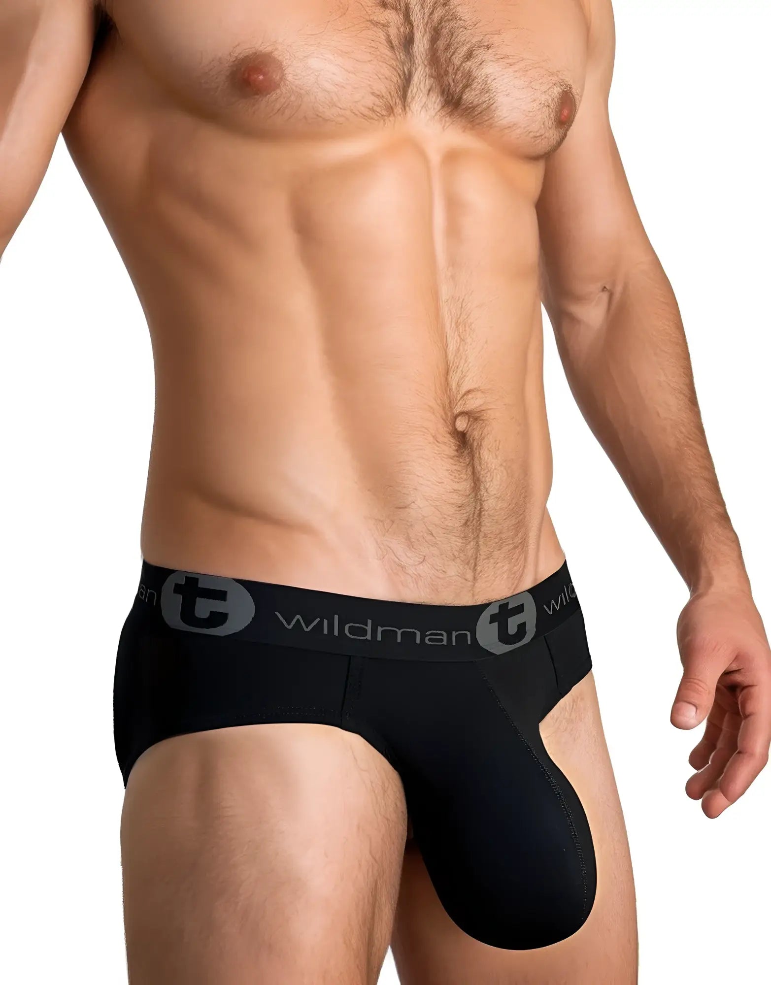 Muscular man wearing WildmanT black cotton briefs with a prominent front pouch and logo-branded elastic waistband.