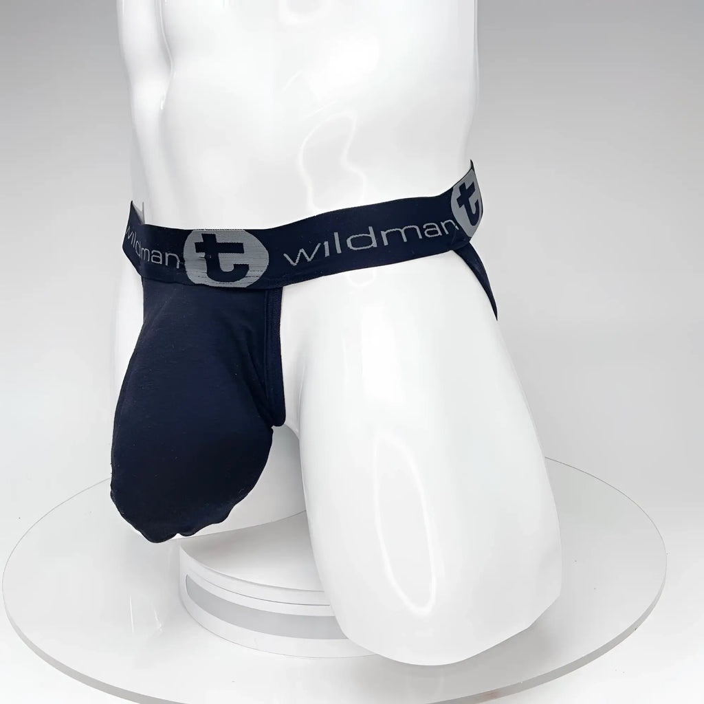 WildmanT black jockstrap on a mannequin, featuring a prominent front pouch and branded elastic waistband with logo.