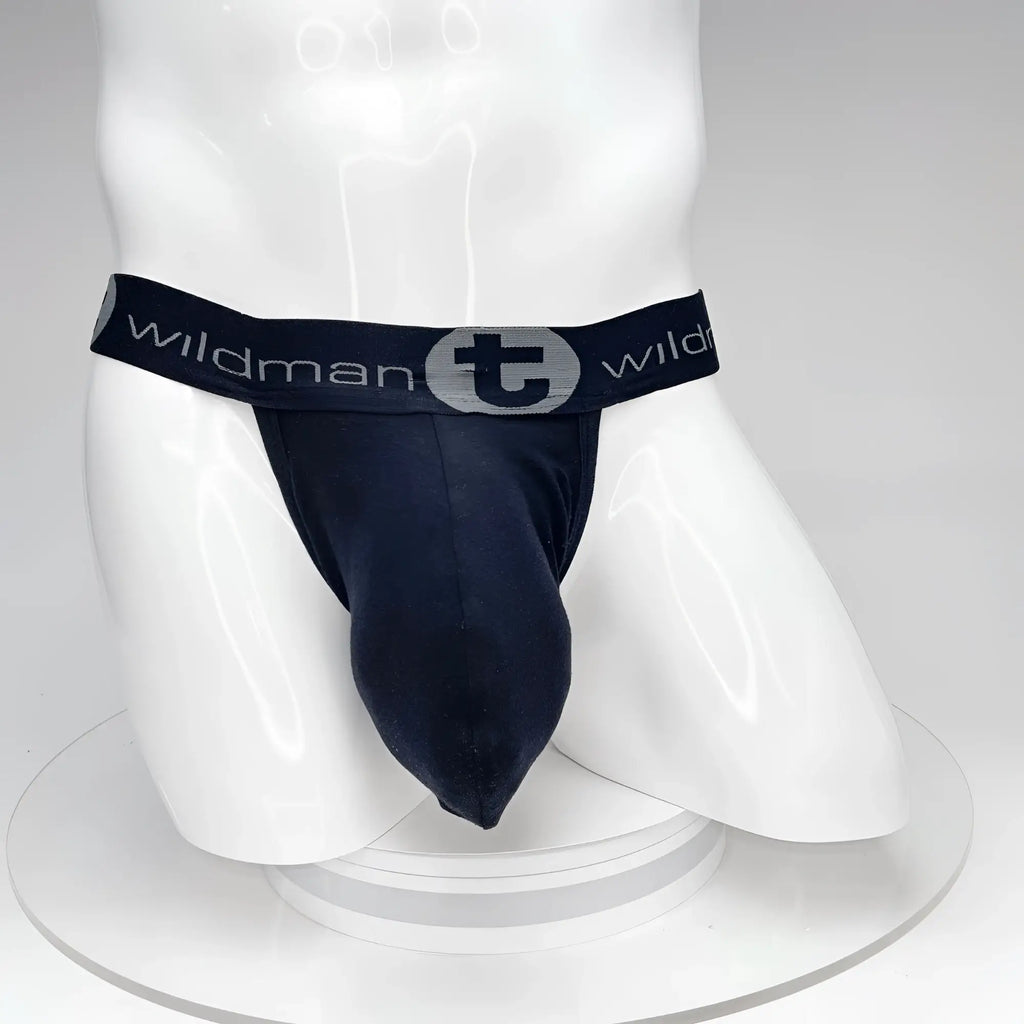 Black WildmanT jockstrap with a large pouch and branded waistband on a white mannequin torso.