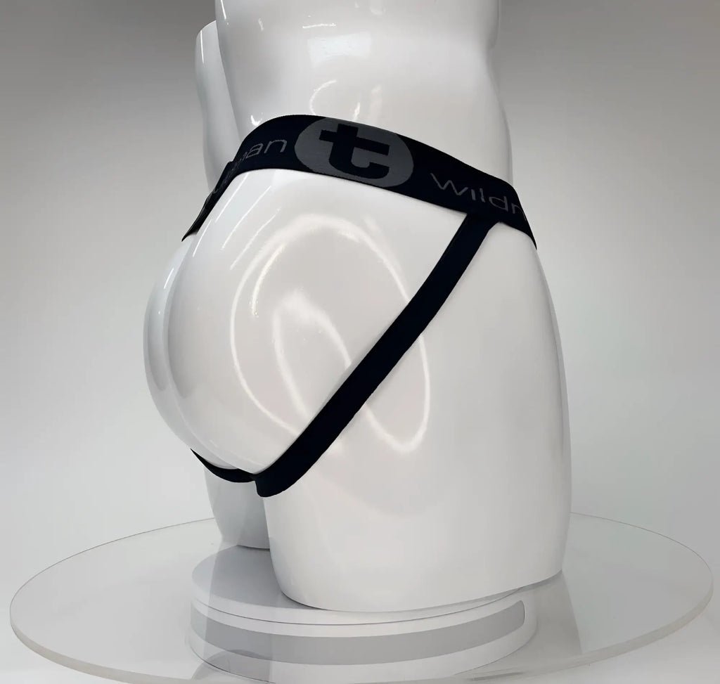 White mannequin wearing a black WildmanT jockstrap with a branded elastic waistband and side straps.