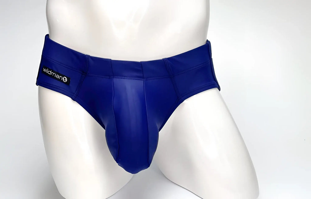 WildmanT Big Boy Pouch swim brief in navy blue on a white mannequin with a branded side tab.