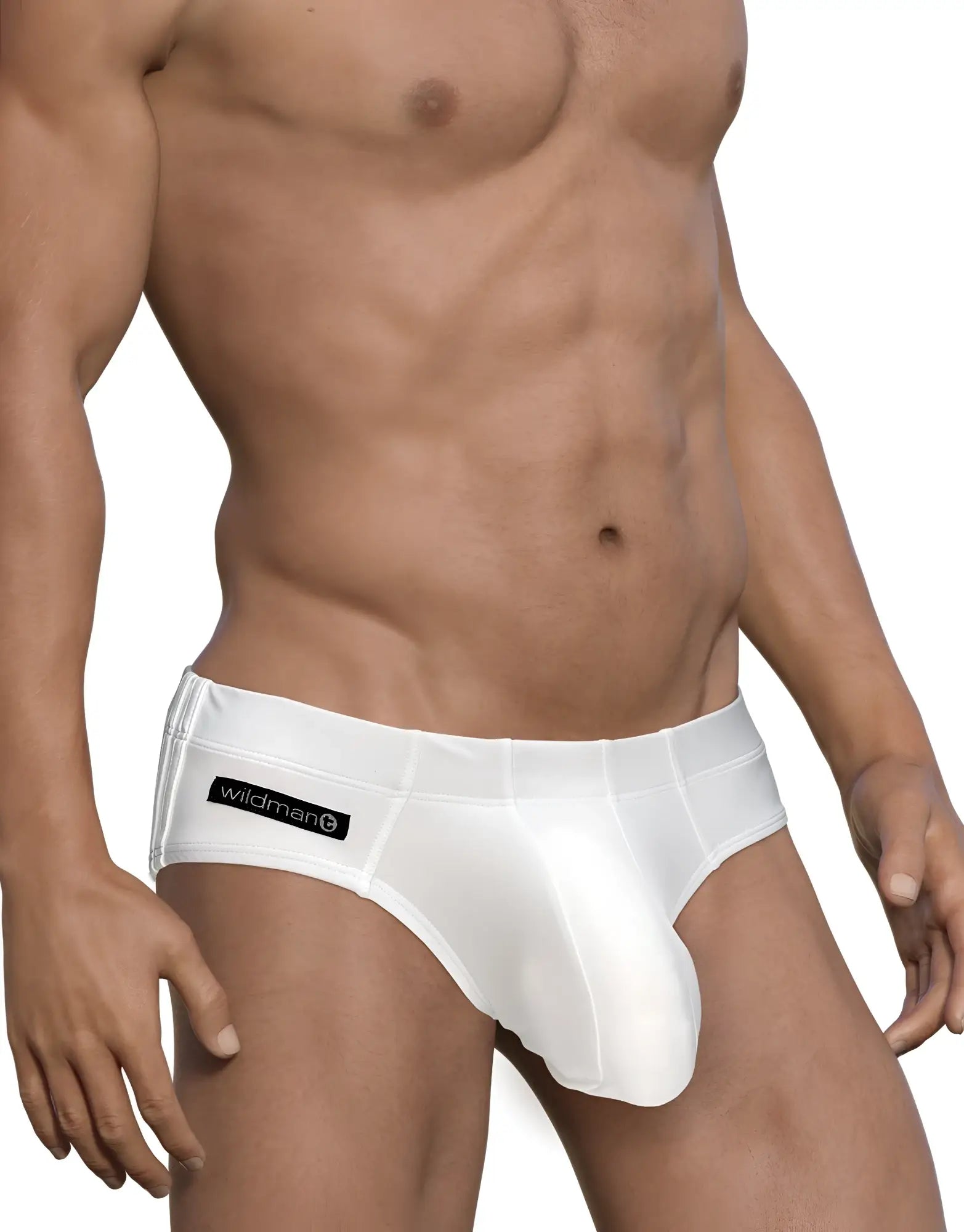 White WildmanT Big Boy pouch swim brief with a black logo patch on the side, worn on a fit male torso.