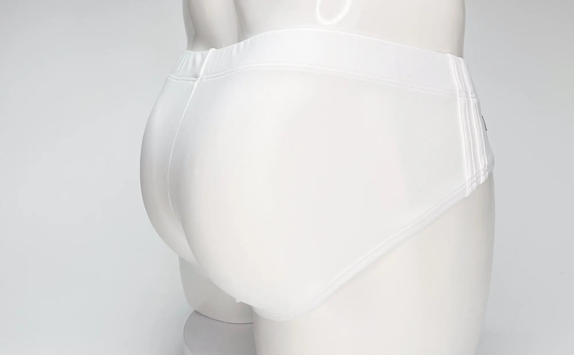 WildmanT big boy pouch swim brief white with smooth seamless design and elastic waistband for comfortable fit