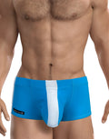 Teal blue WildmanT square-cut swim trunks featuring a white center pouch panel and side stripe branding.