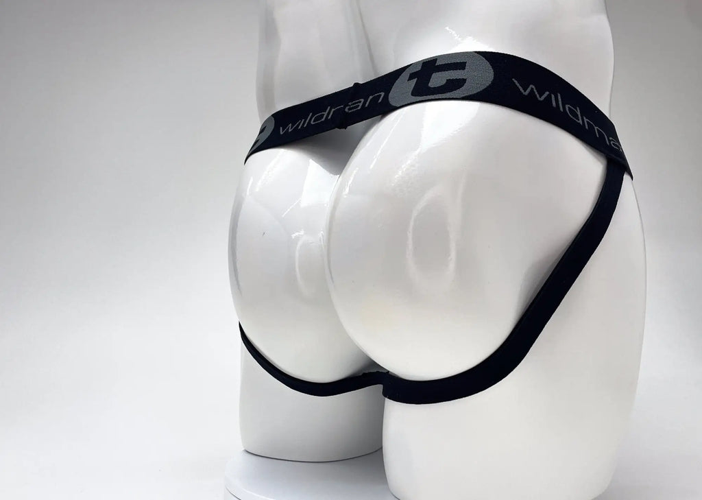 WildmanT black jockstrap with a branded waistband worn on a white mannequin.