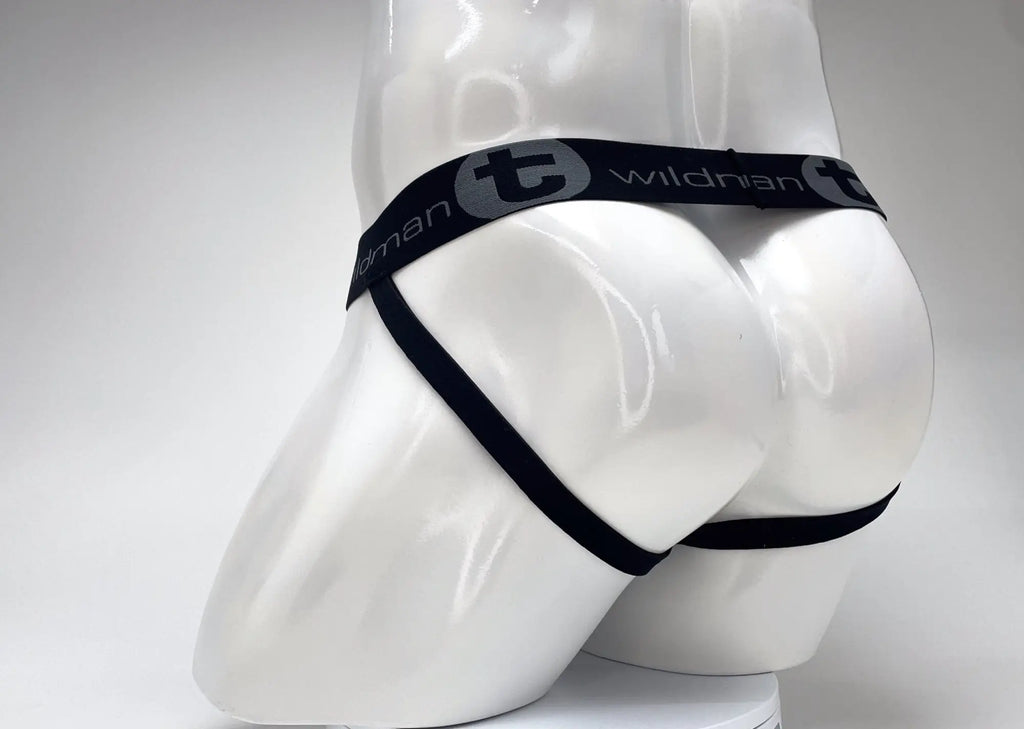 Back view of a WildmanT black and red striped jockstrap on a white mannequin, featuring a branded elastic waistband.