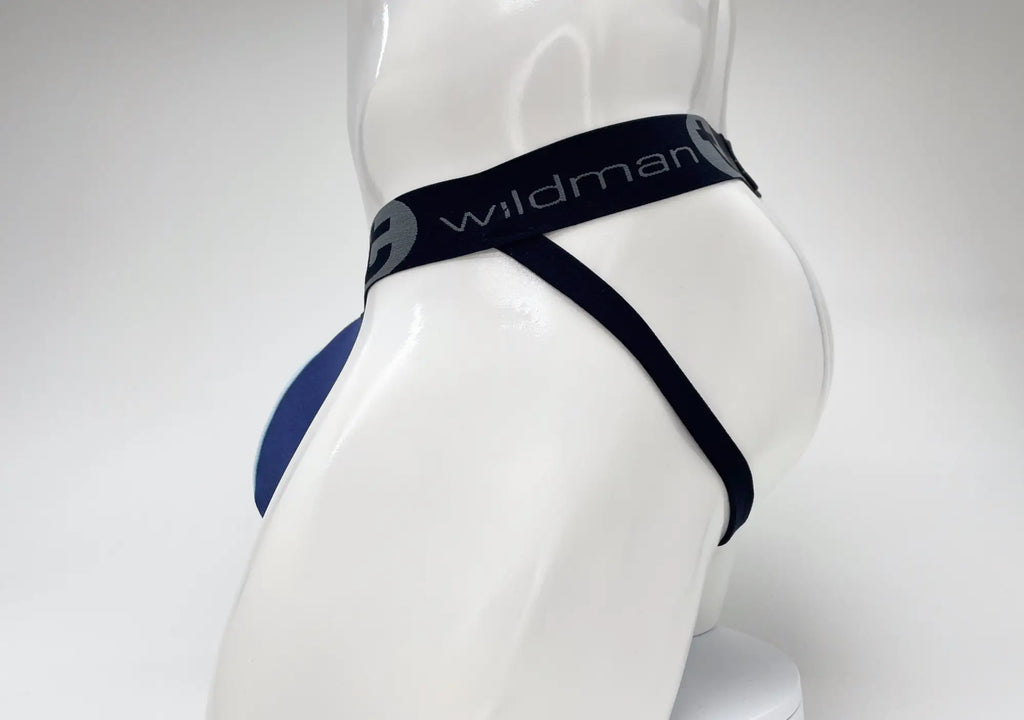 WildmanT royal and baby blue jockstrap with a black branded elastic waistband on a white mannequin torso.