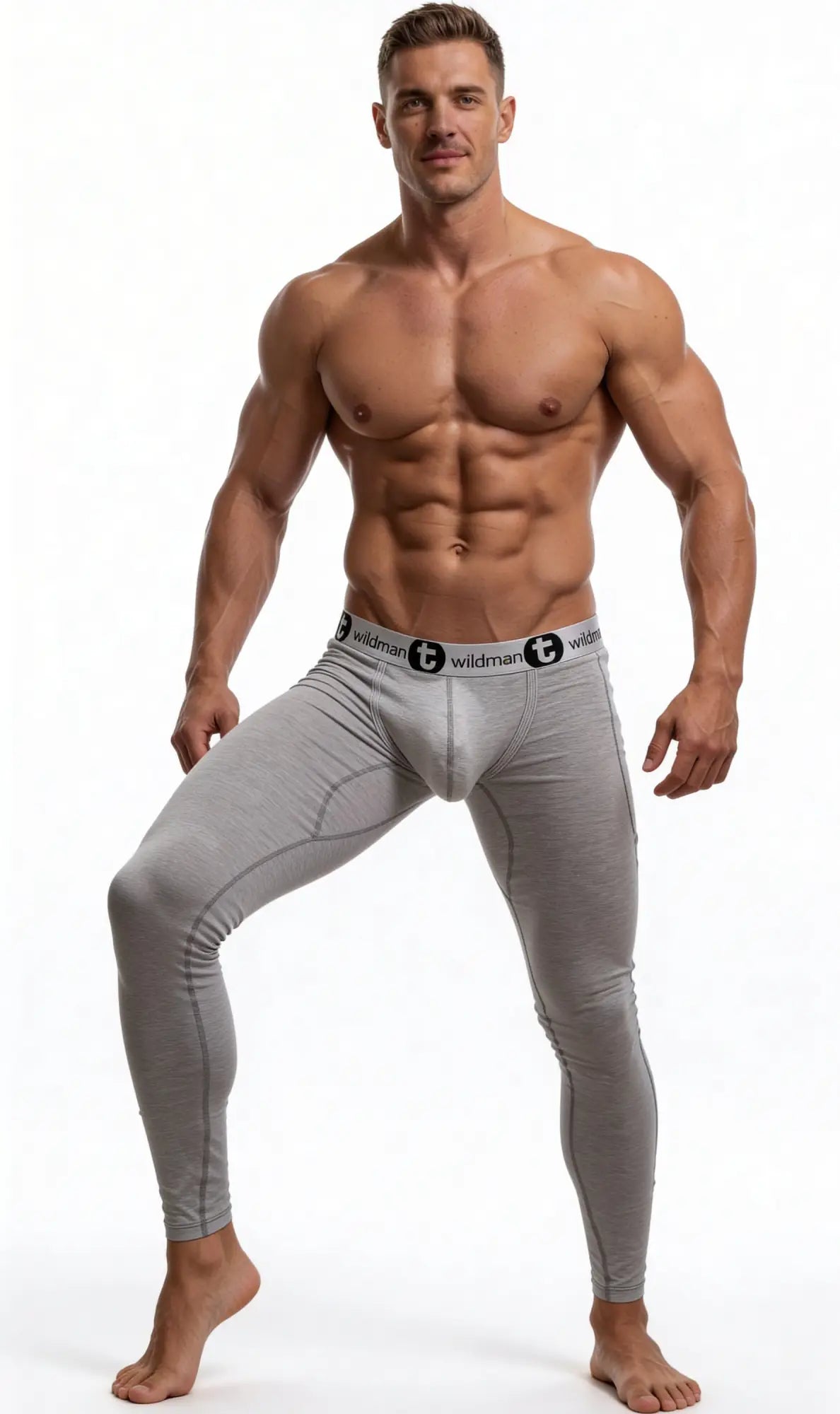 Muscular man wearing grey WildmanT cotton long johns with a contoured Big Boy pouch and branded elastic waistband.