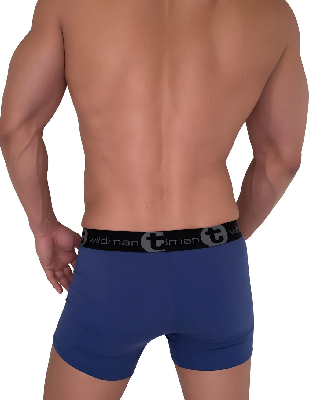 Rear view of a man wearing dark blue 5-inch inseam boxer briefs with a black waistband featuring the WildmanT logo.