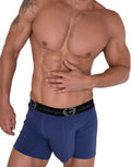 Dark blue WildmanT boxer briefs with a black branded waistband on a muscular man.