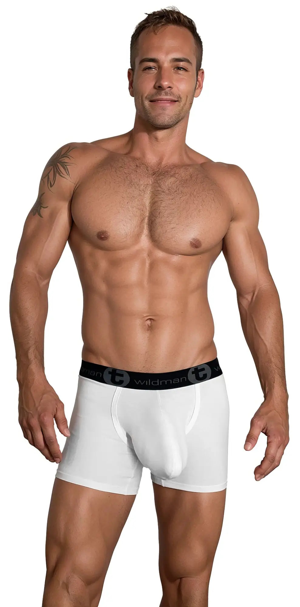 Muscular man modeling white 5-inch inseam boxer briefs with a black waistband featuring the WildmanT logo.