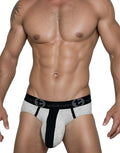 WildmanT cotton briefs in grey and black with a branded black waistband on a muscular man.