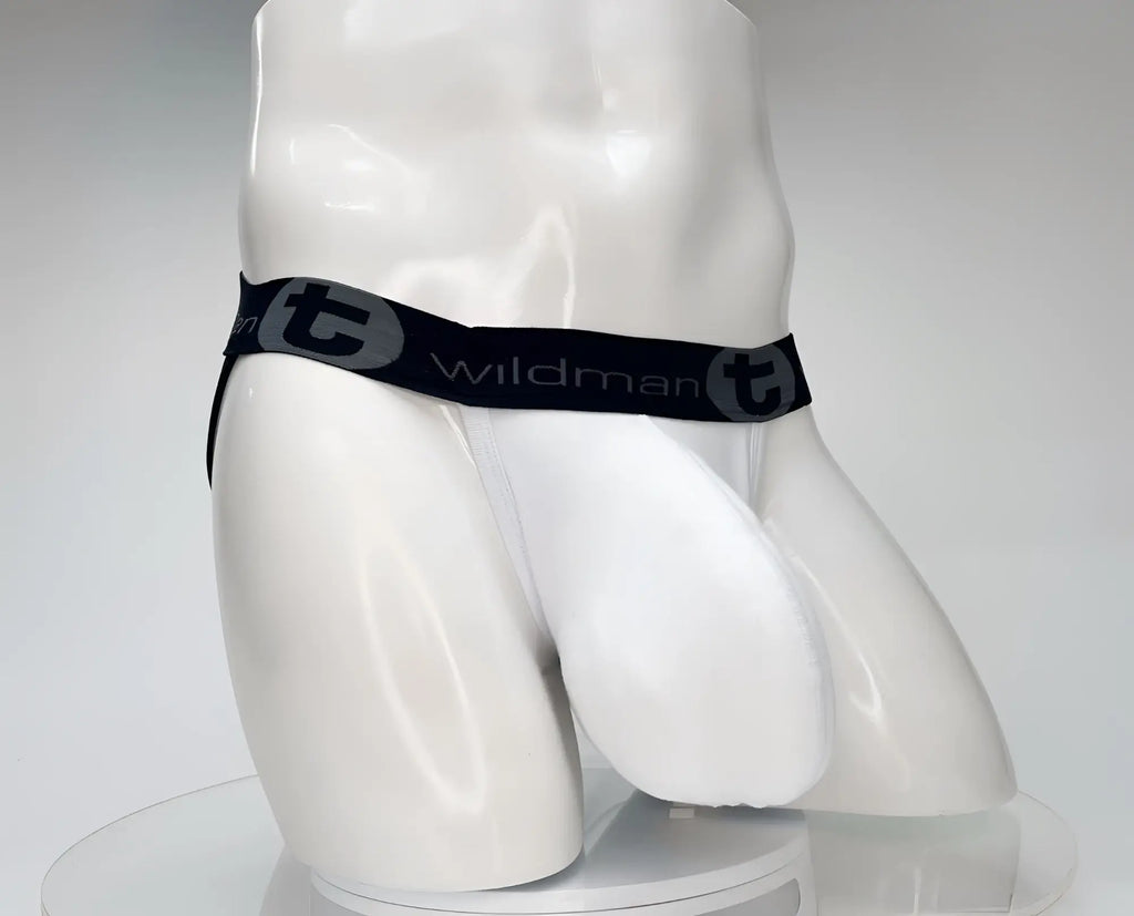 White WildmanT cotton jockstrap on a mannequin, featuring a black waistband with "wildman t" branding.