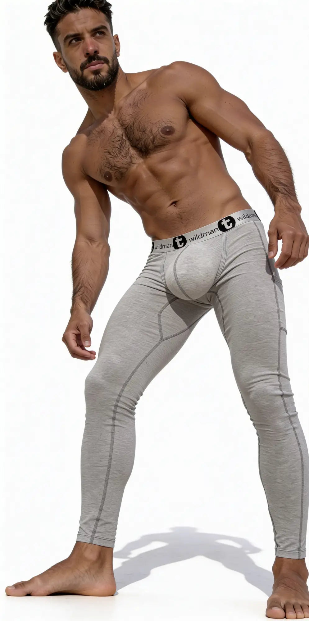 Grey long johns with a contour pouch and branded elastic waistband worn by a shirtless muscular man.