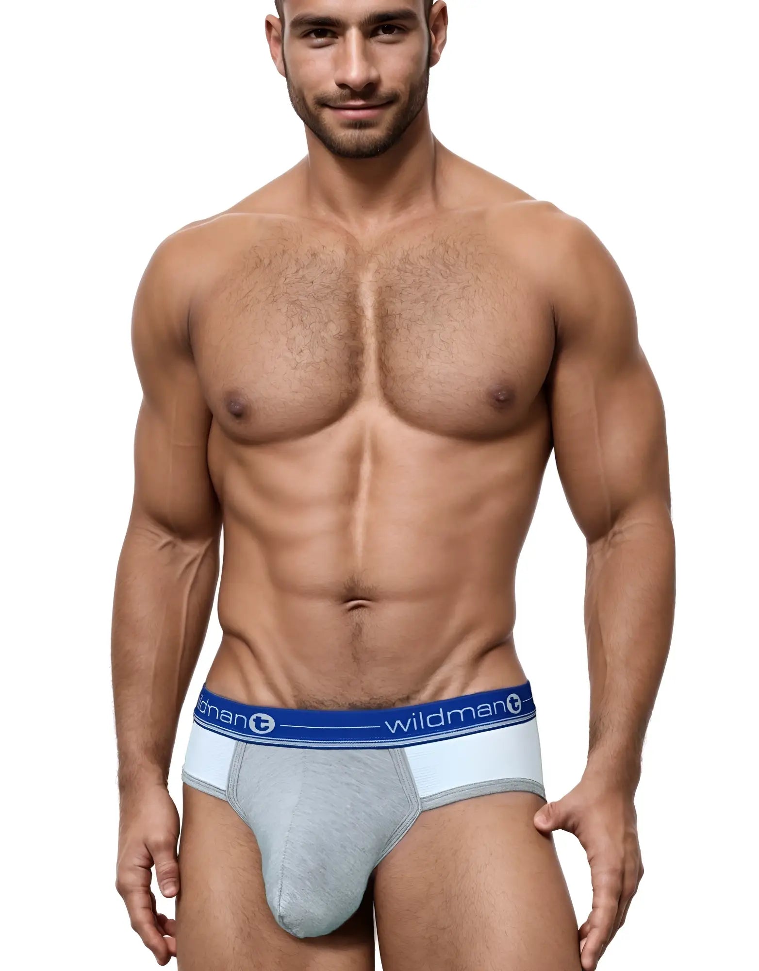 Athletic man wearing Duo Big Boy blue and grey pouch briefs with a branded elastic waistband.