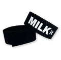 Two black elastic cock rings with white "MILK it" text and adjustable velcro closures on a white background.